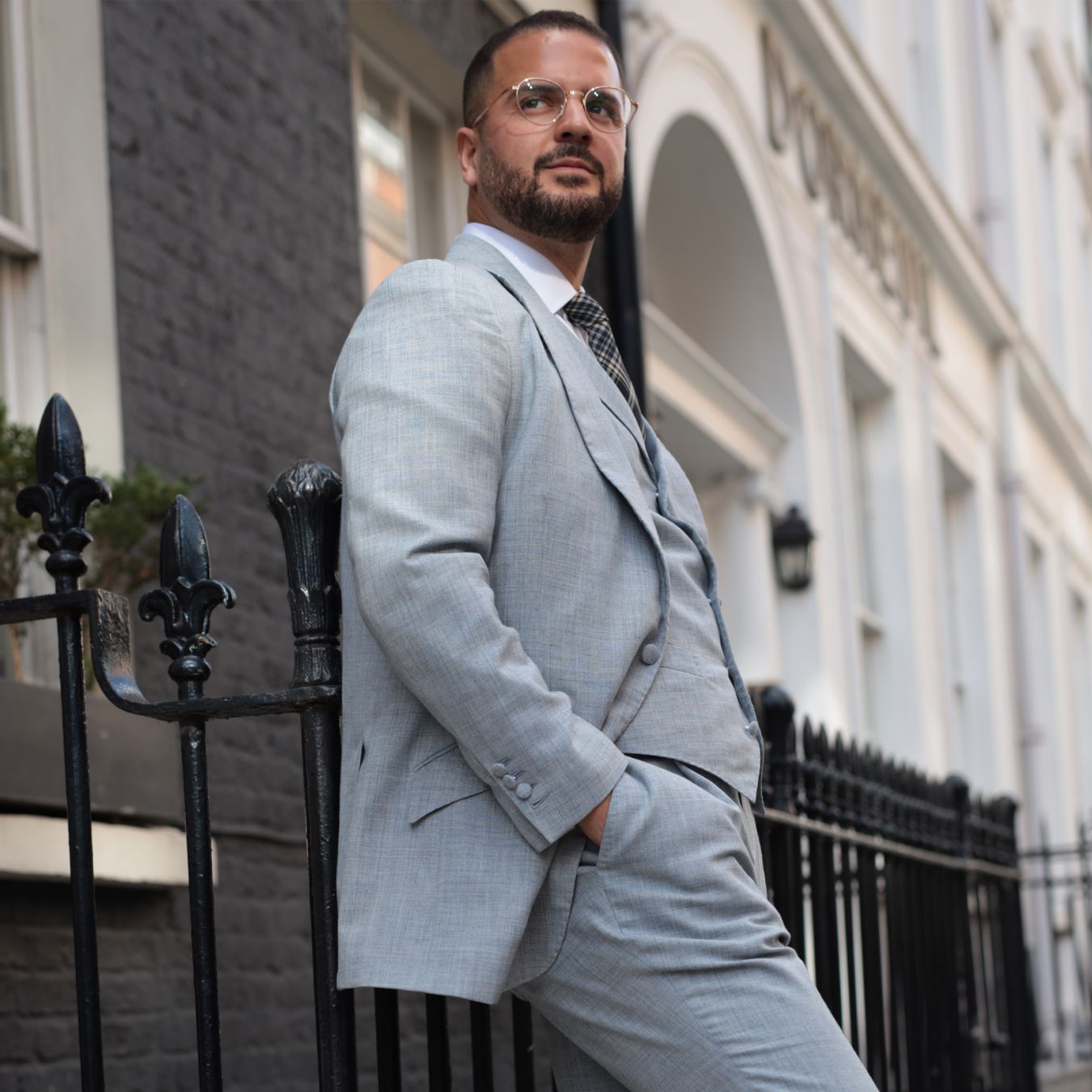 Close-up of a sharp business suit jacket with custom lapels, perfect for corporate attire.