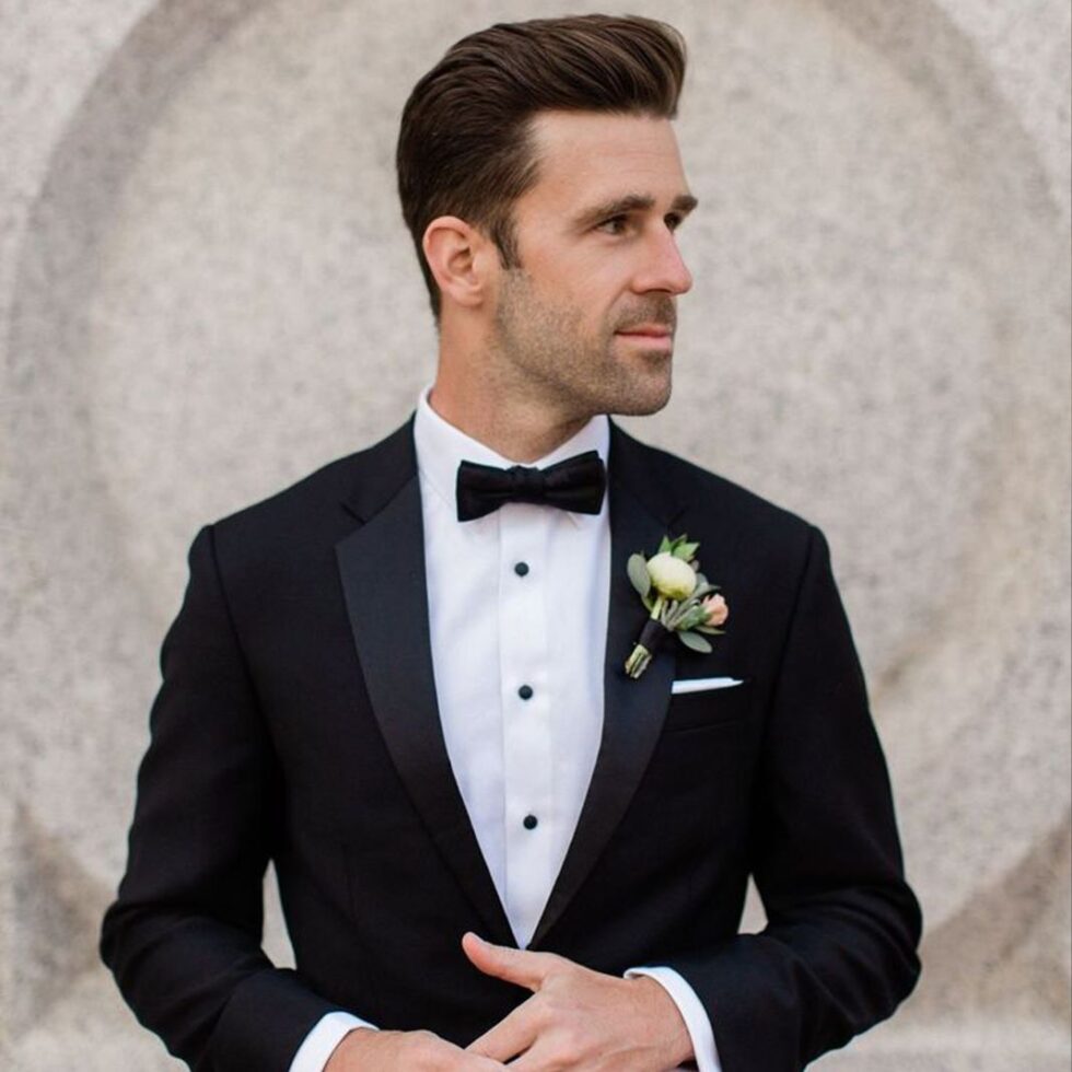 Man wearing a dinner suit at a wedding
