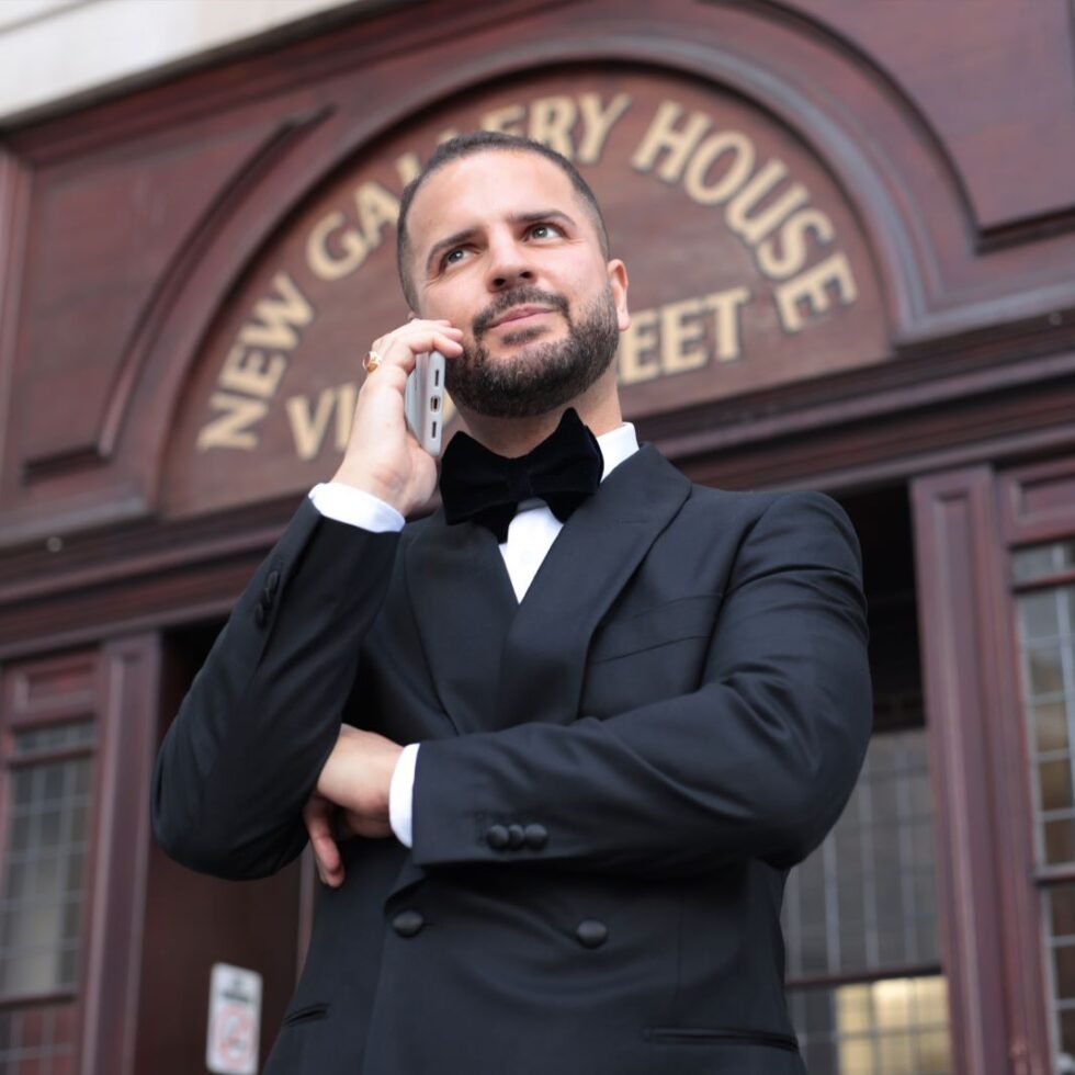 Dinner suit worn with a white shirt and black bow tie