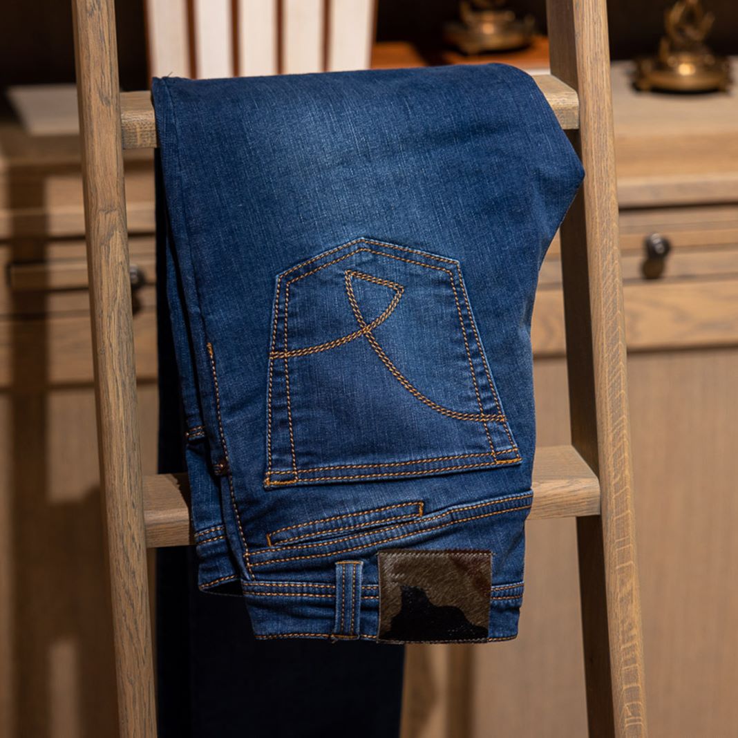 Raw denim jeans with a classic straight fit and clean seams