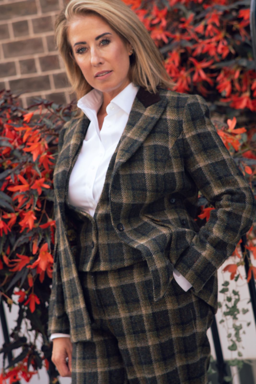 A photo of Nathalie from Fielding & Nicholson dressed in bespoke wear