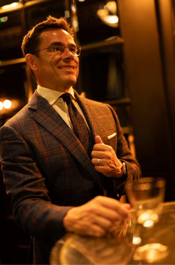 A photo of a suited gentleman at The Savoy