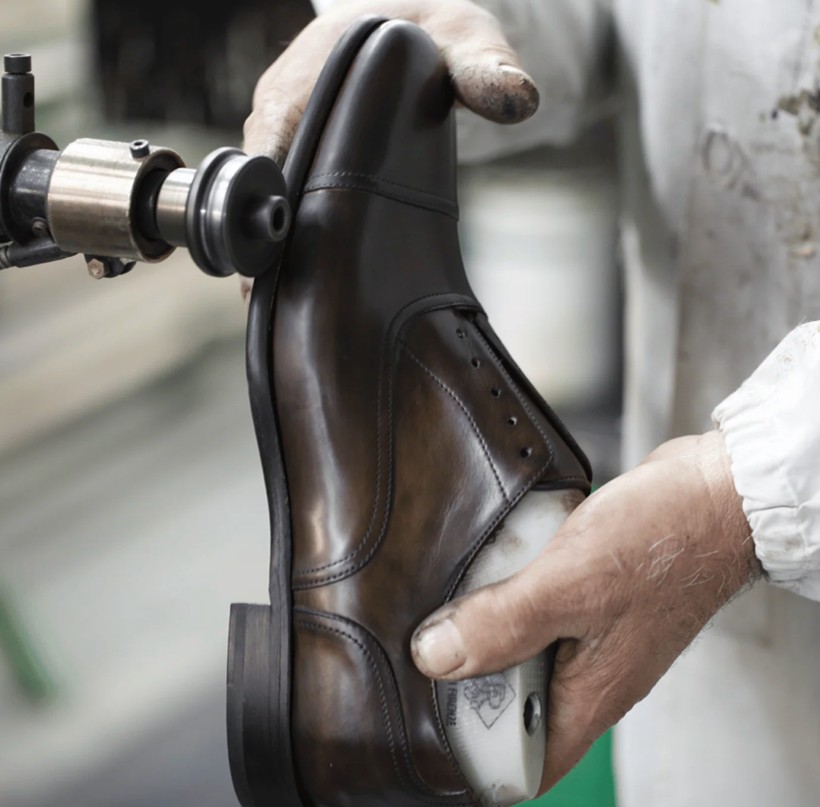 A photo of custom business shoes being made