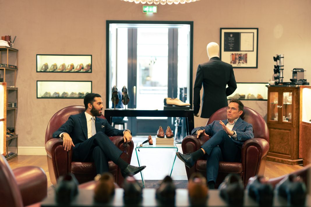 a photo of a bespoke suit consultation happening