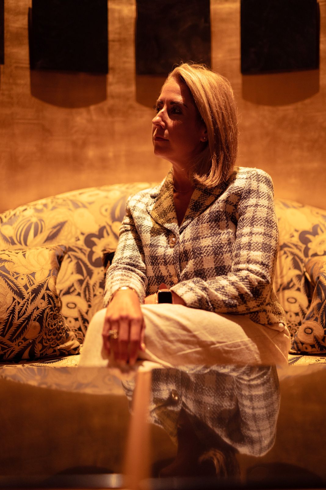 a photo of a stylish lady in tailored clothing