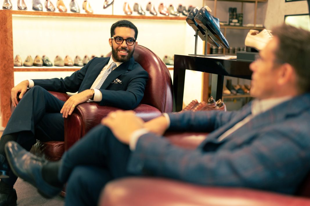 a photo of a tailoring consultation in progress