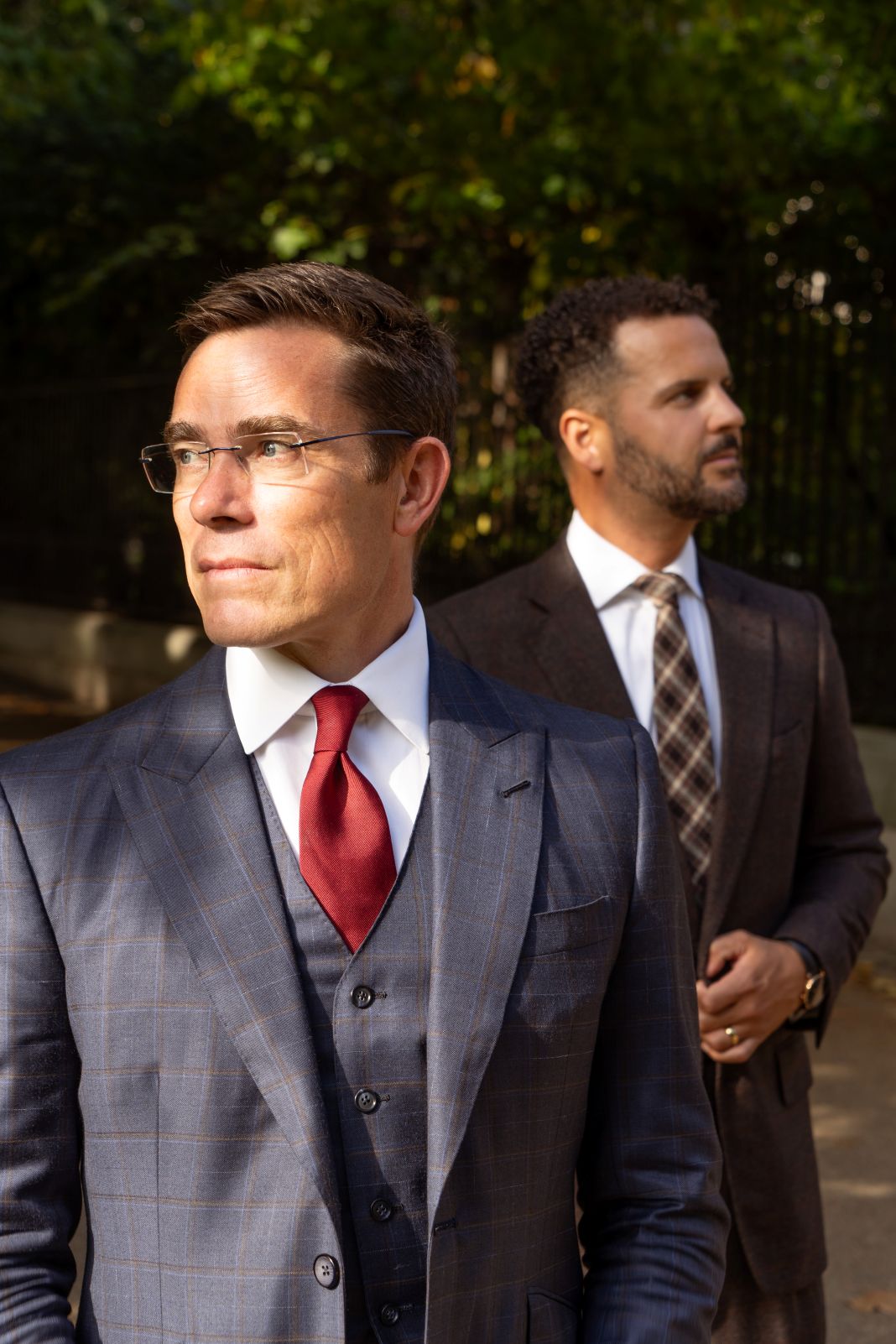 a photo of two men wearing suits in London