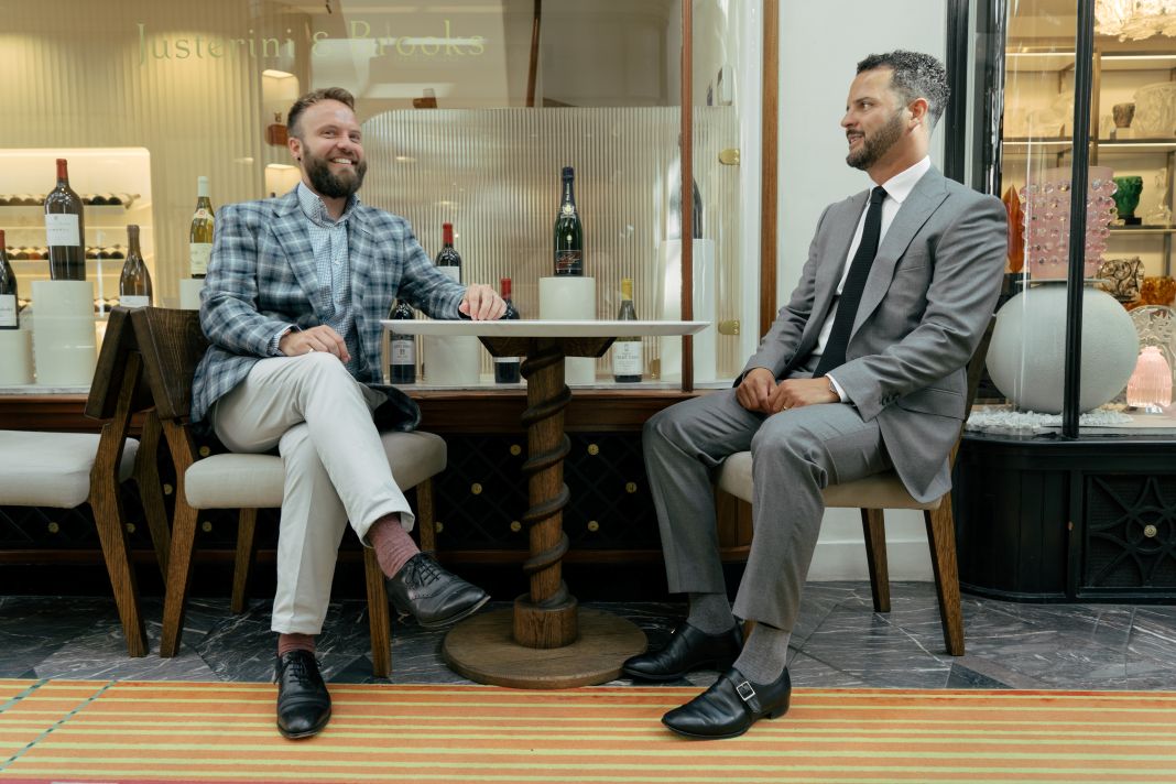 a photo of two tailors enjoying a discussion about tailoring