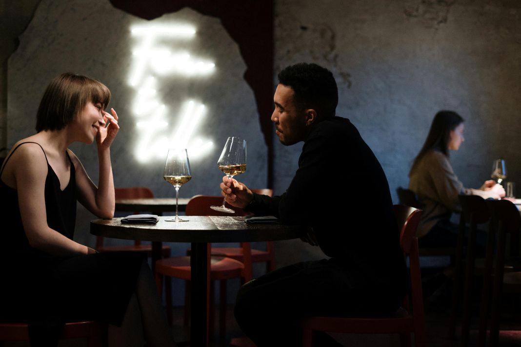 A photo of a couple on a date at a restaurant