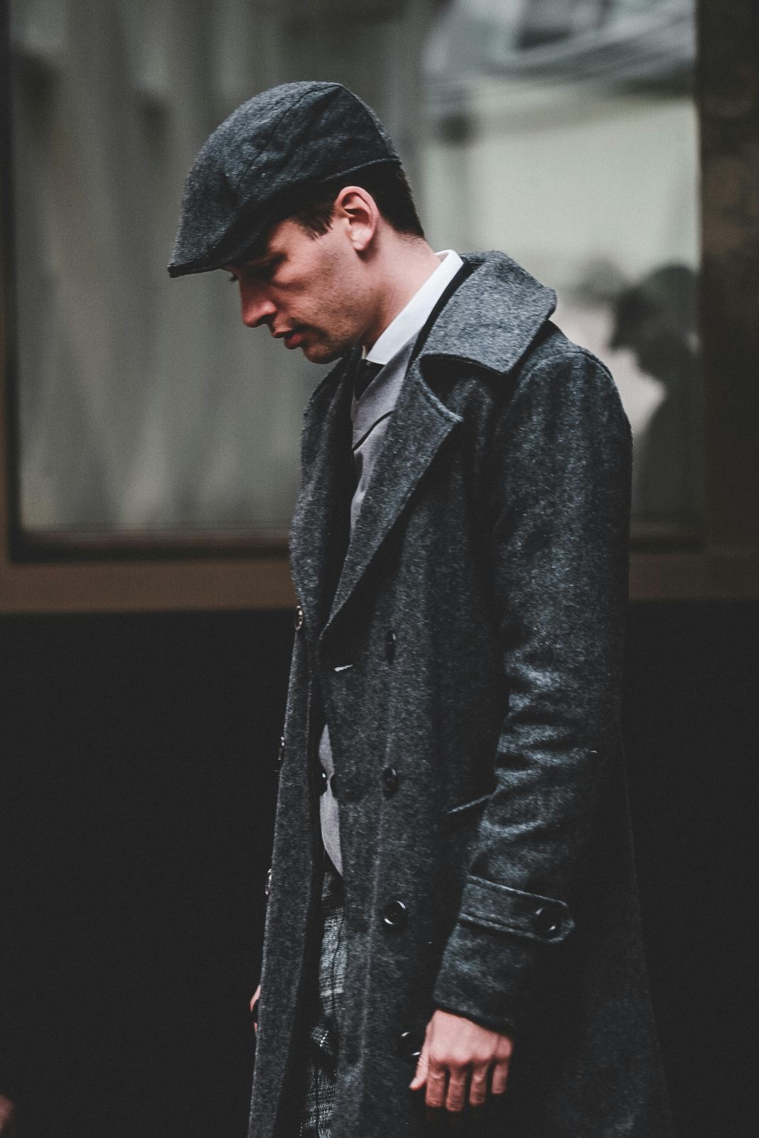 A photo of a man wearing a wool overcoat
