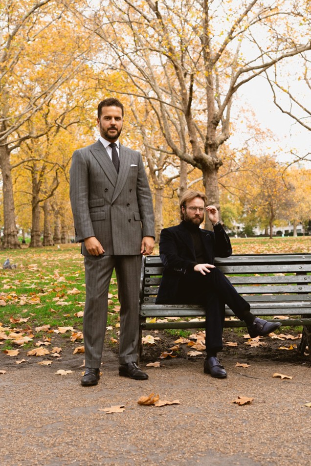 A contemporary grey suit outfit photographed in a London park, highlighting refined seasonal tailoring