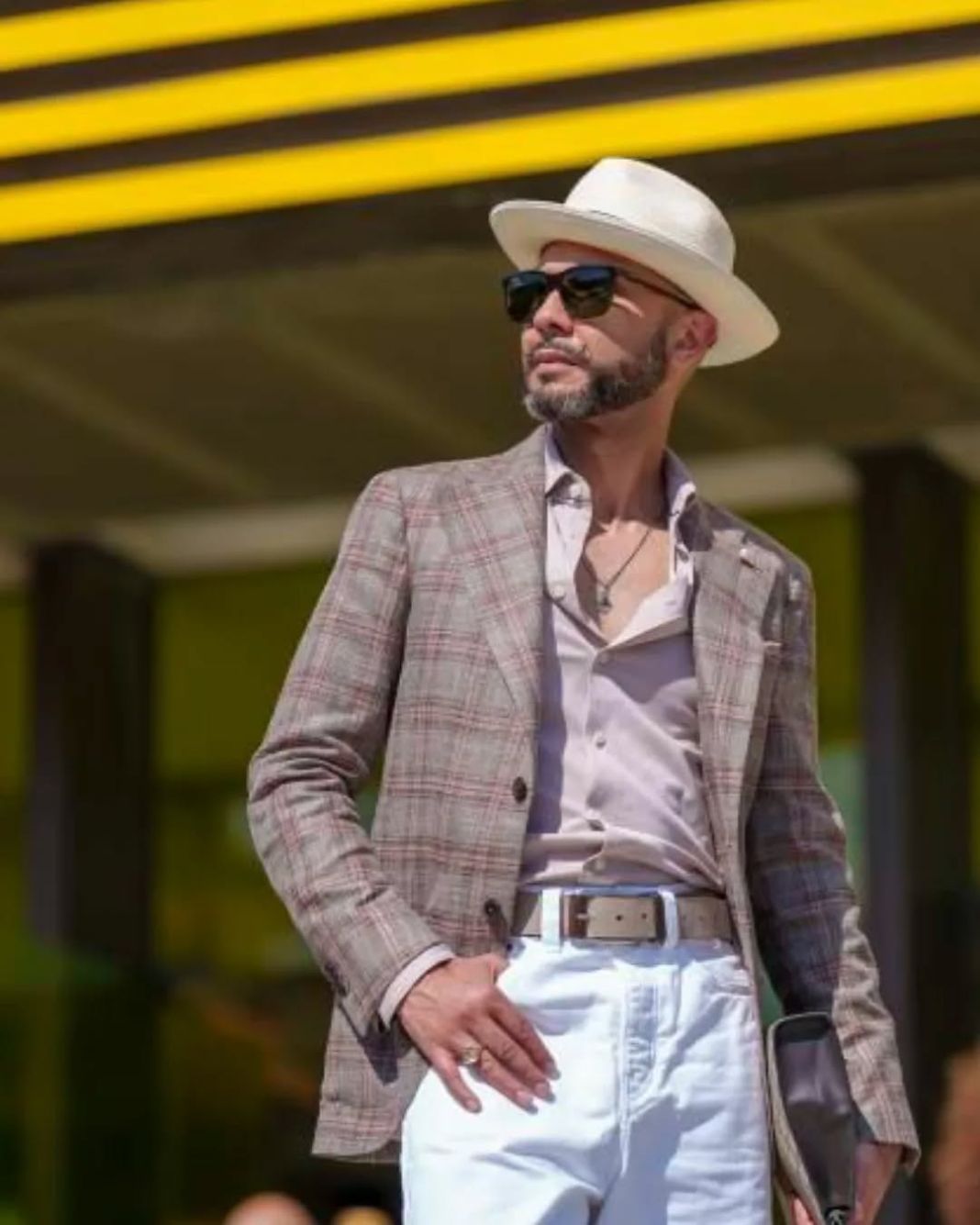 a photo of a structured outfit look on a gentleman on holiday