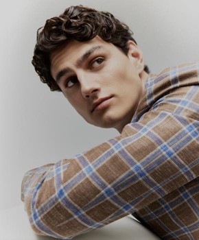 A photo of a man wearing new 2026 checked fabrics