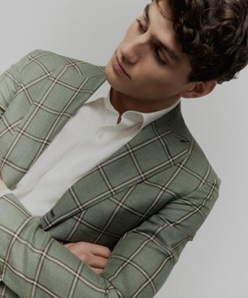 A photo of a man wearing new 2026 fabrics