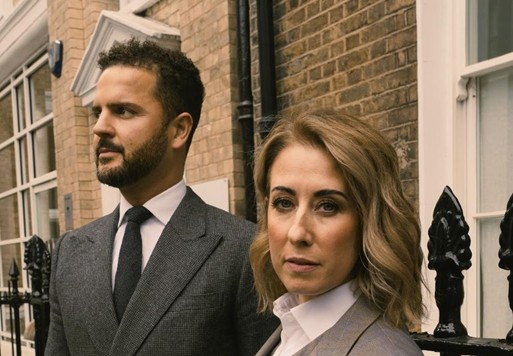 A photo of two tailors from fielding and nicholson