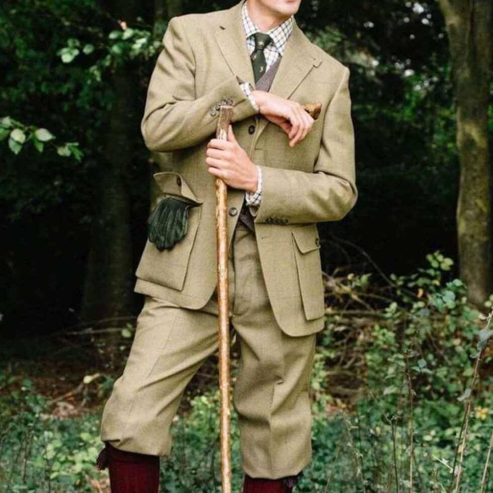 Beige shooting jacket worn with country trousers, sample image