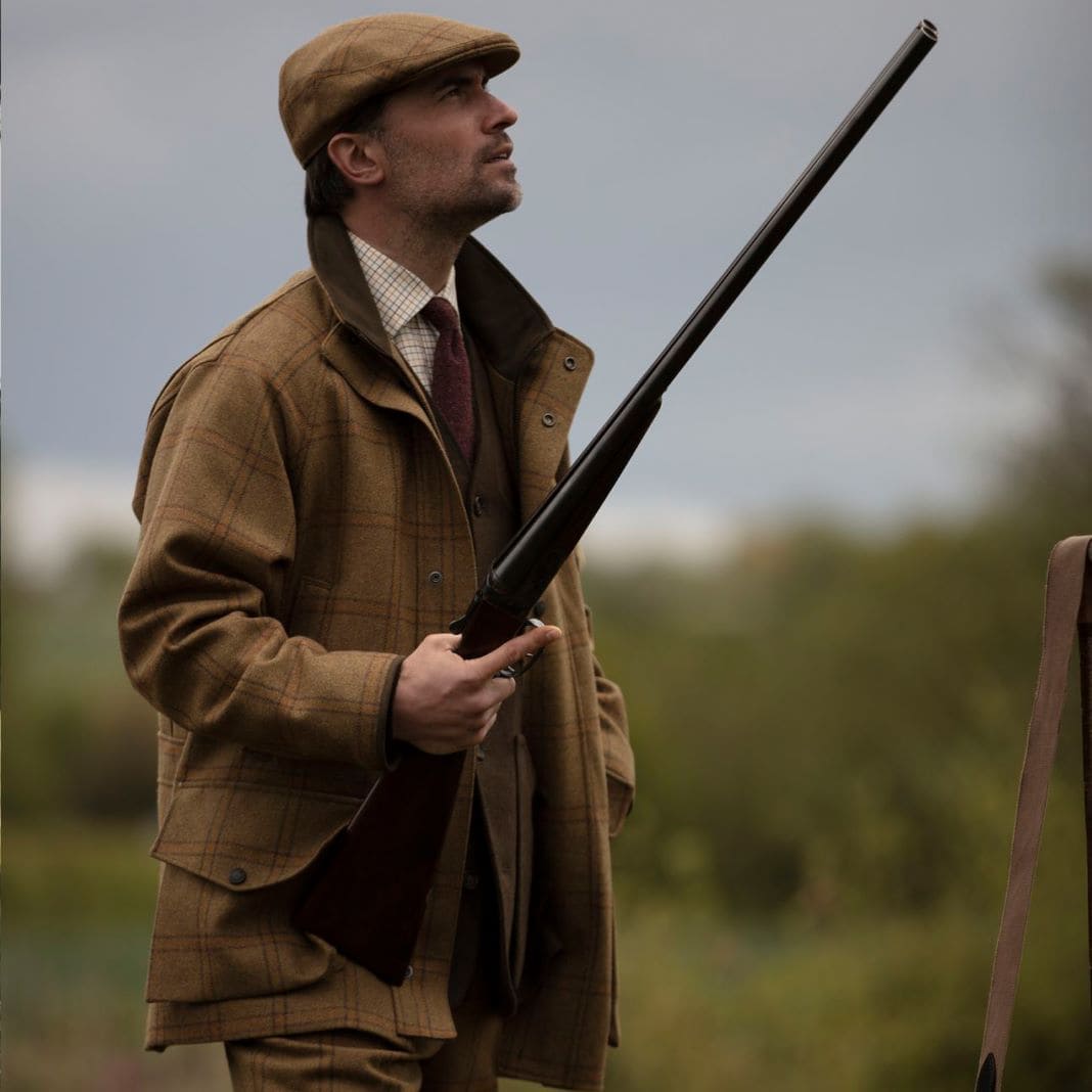 Brown tweed shooting jacket worn with a country waistcoat, sample image