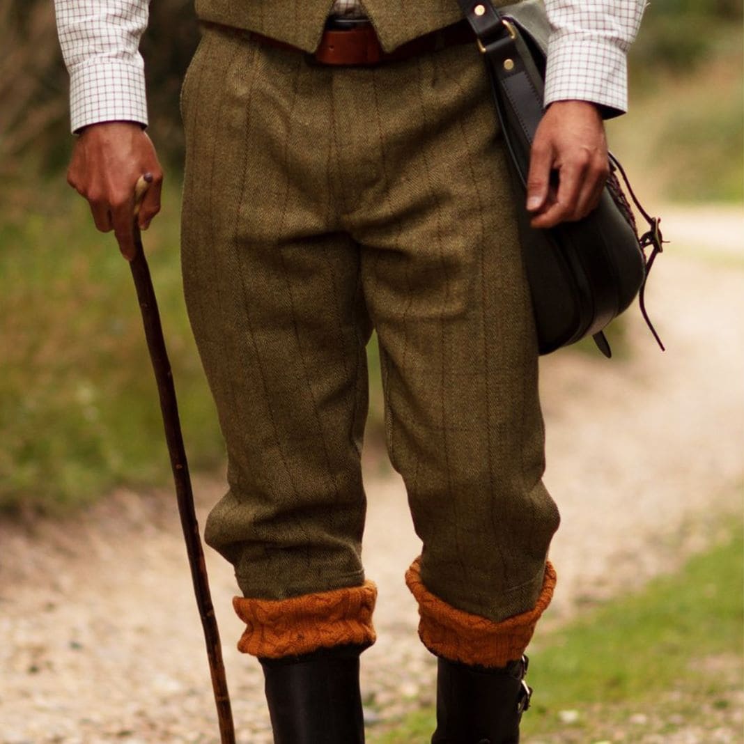 Brown tweed shooting trousers worn with a leather belt, sample image