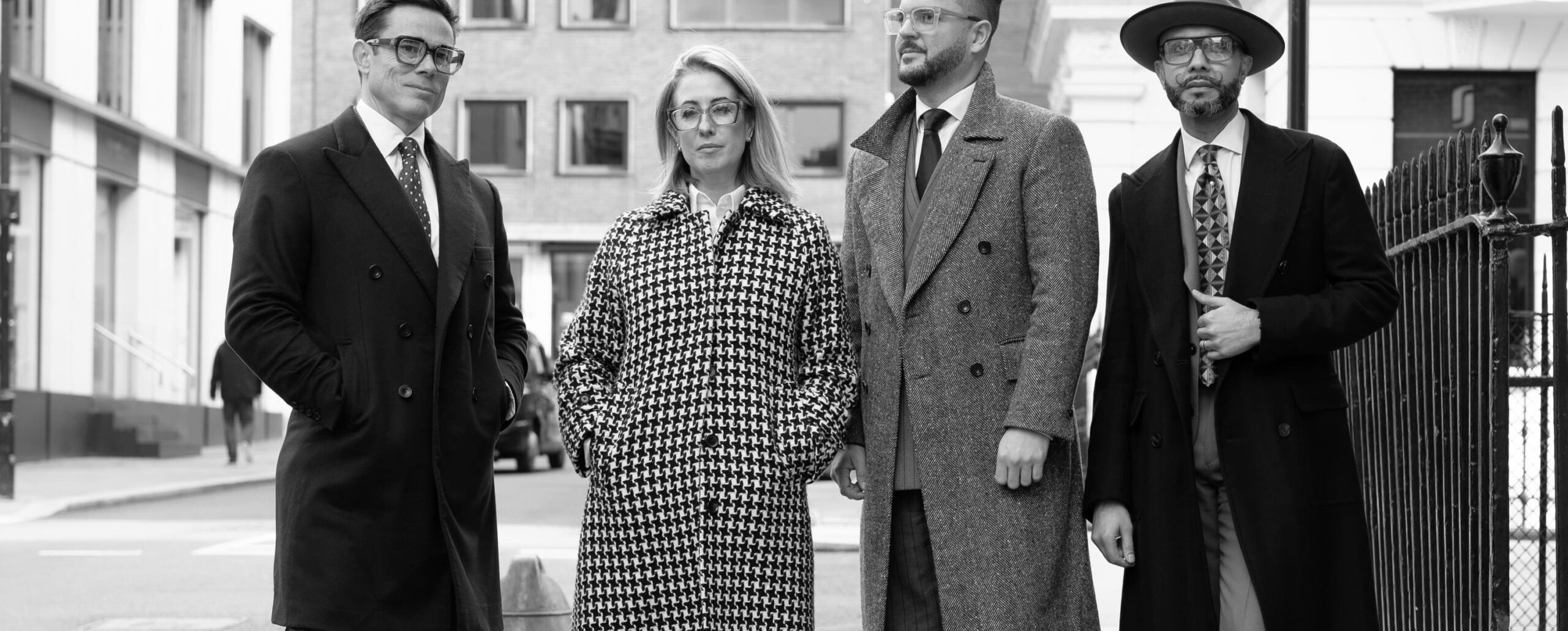 Men in classic tailored overcoats and suits, sample image