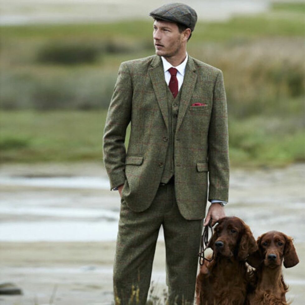 Green tweed country suit worn with a red tie, sample image