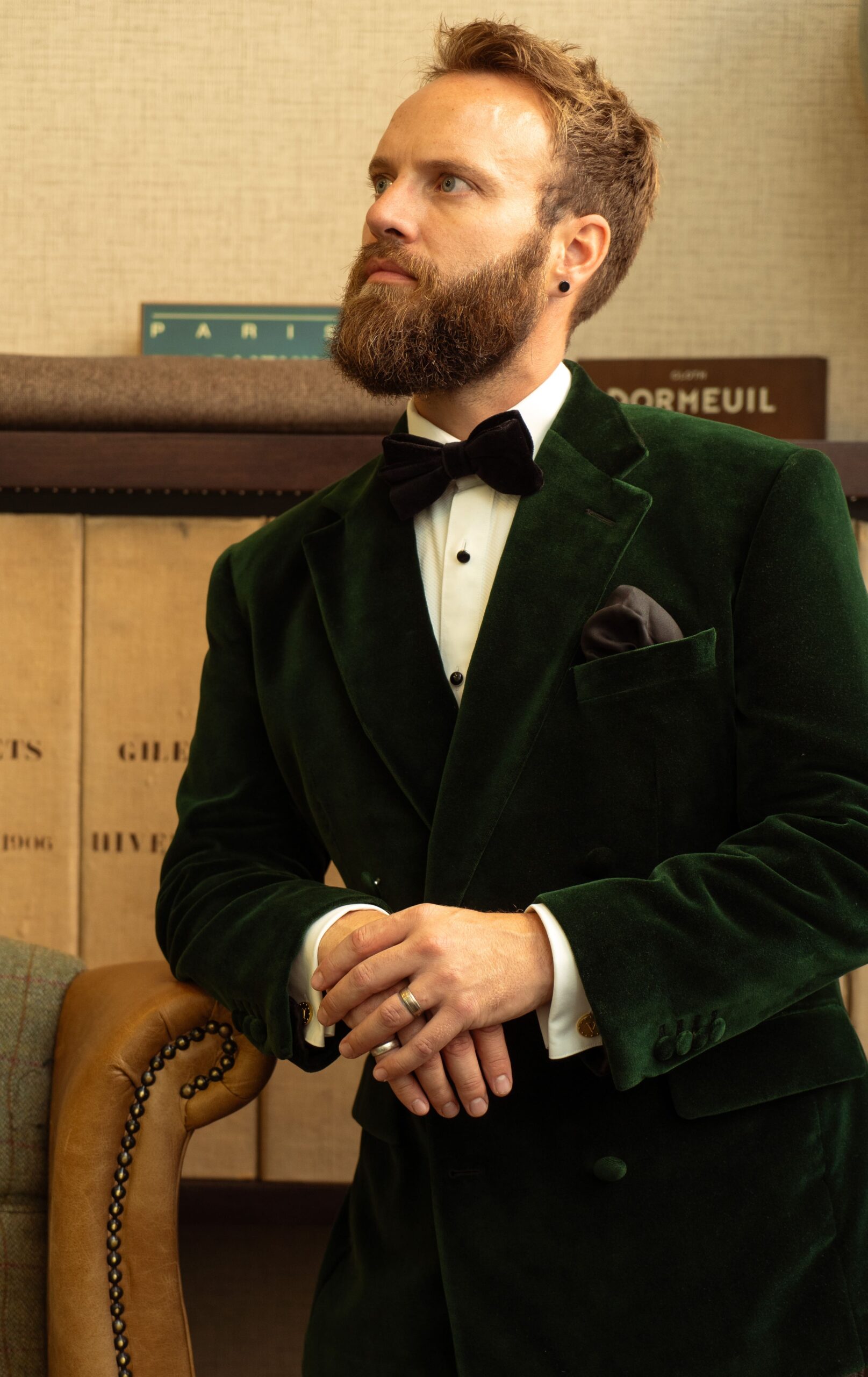 Green velvet dinner jacket worn with a bow tie, sample image