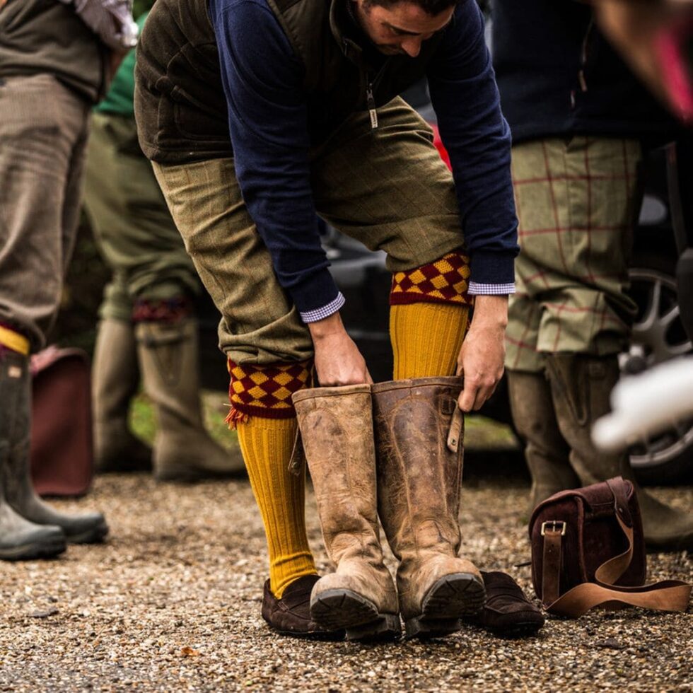 Leather shooting boots worn with knee-length shooting socks, sample image