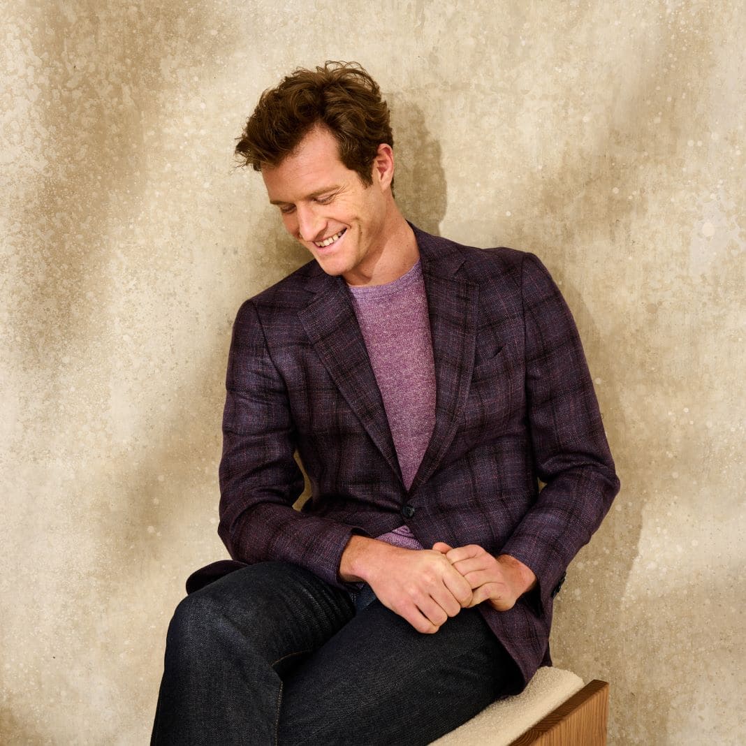 Purple check blazer worn with a crew neck shirt