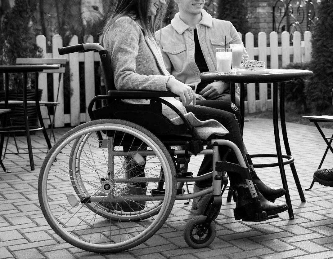Wheelchair user wearing tailored clothing, sample image
