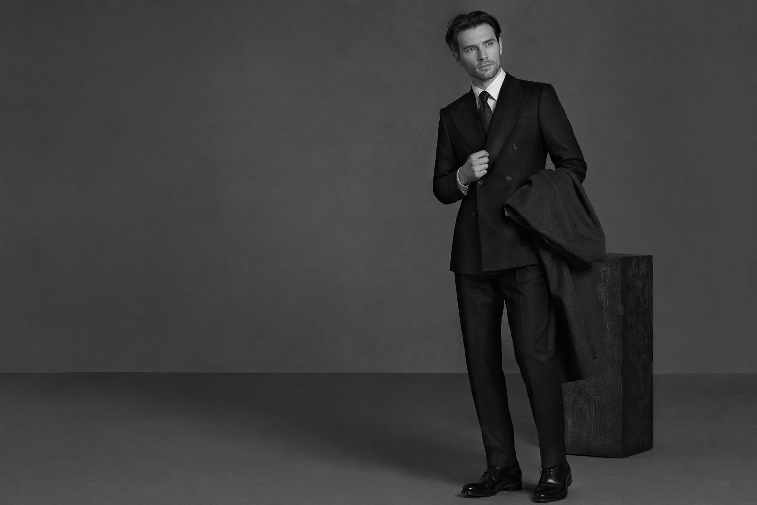Man in a double-breasted tailored suit, sample image