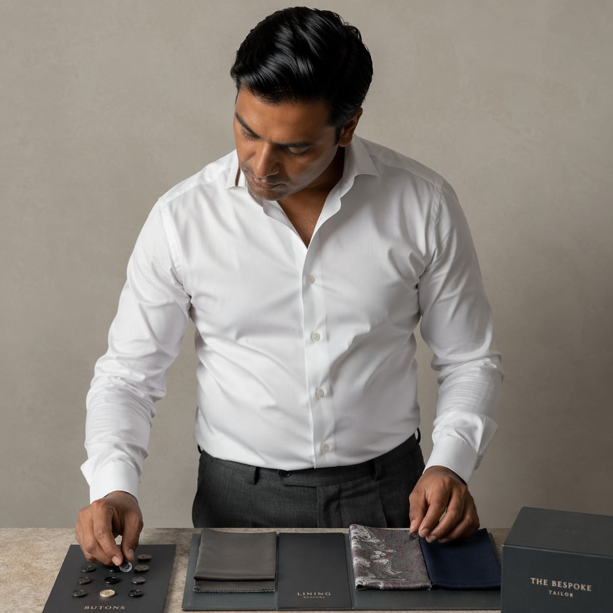 Men's Bespoke – Fabric selection with tailored shirt and styling tools – Sample Image