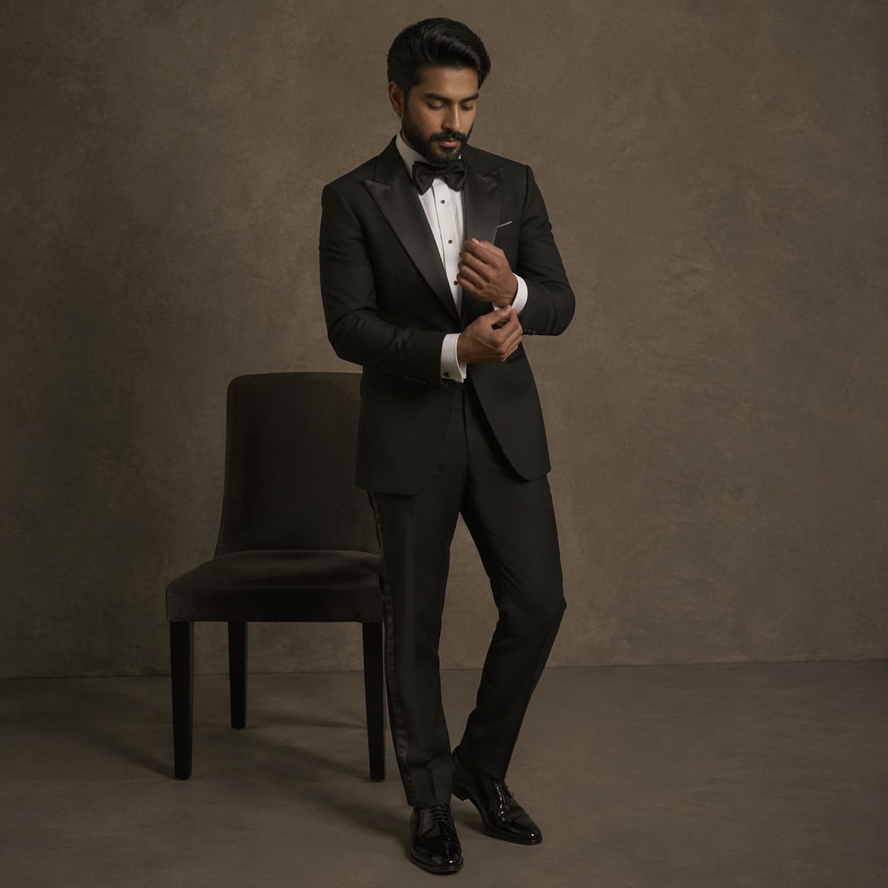Men's Bespoke Suits – Black tuxedo with bow tie – Sample Image Men's Bespoke Suits – Black tuxedo with bow tie – Sample Image