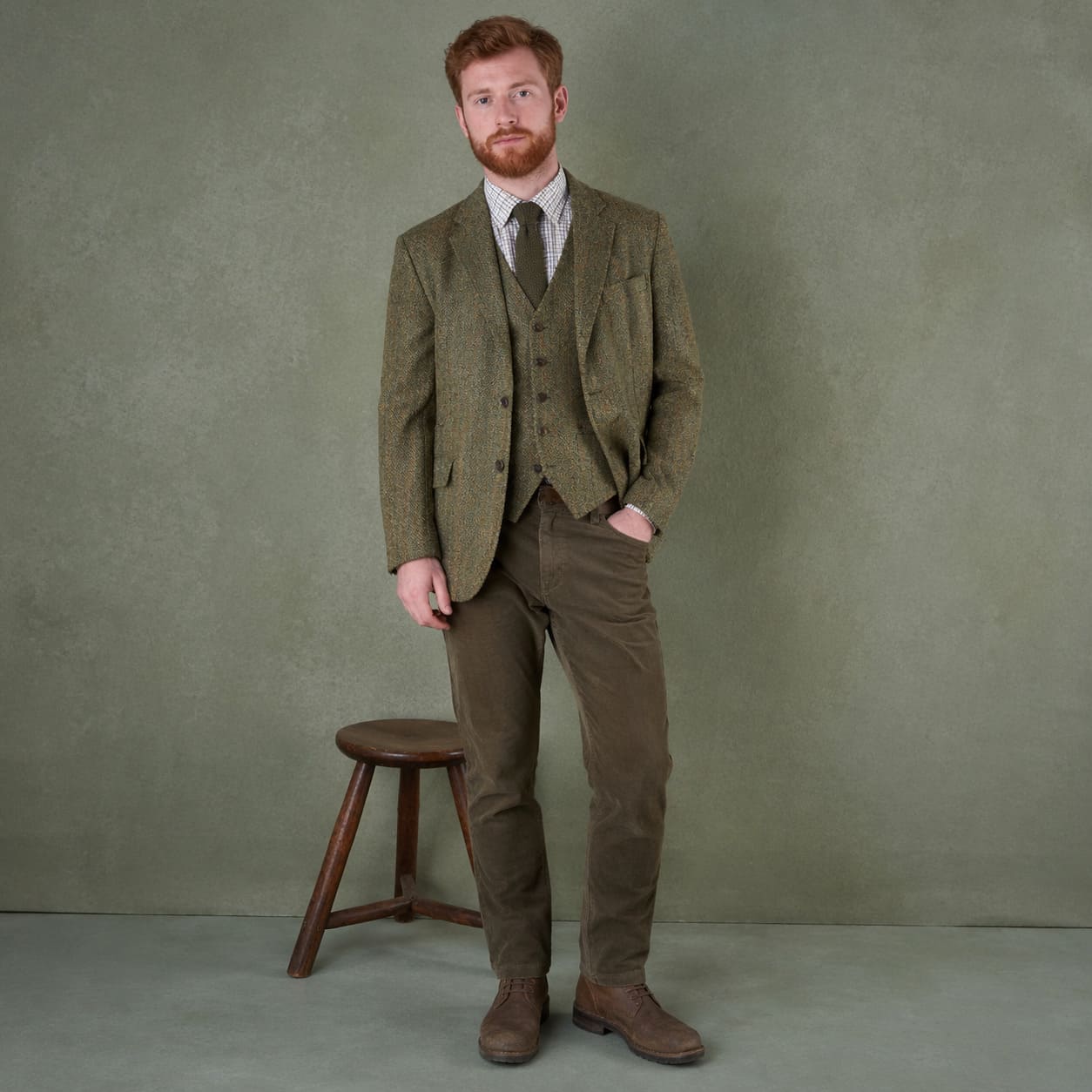 Men's Country Wear – Green tweed suit with waistcoat and rustic styling – Sample Image Men's Country Wear – Green tweed suit with waistcoat and rustic styling – Sample Image