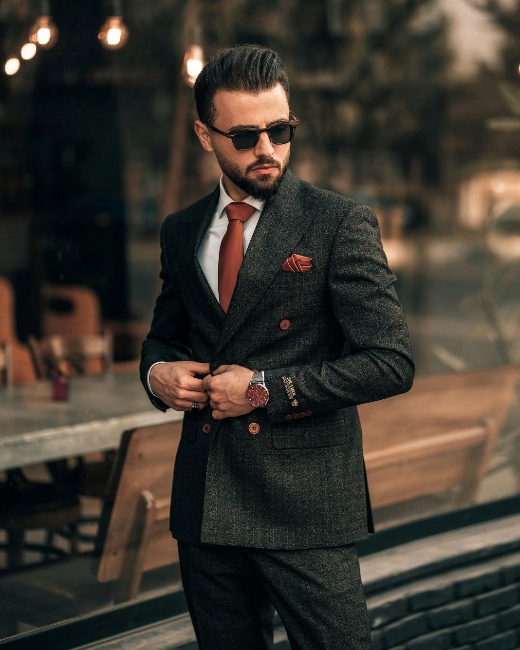 Double-breasted business suit in a dark check