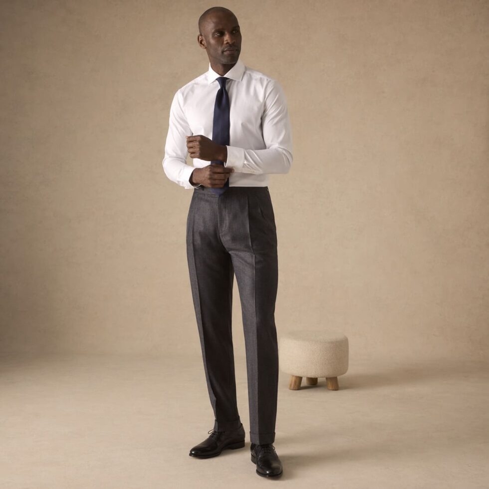 White dress shirt with tie and tailored trousers, sample image