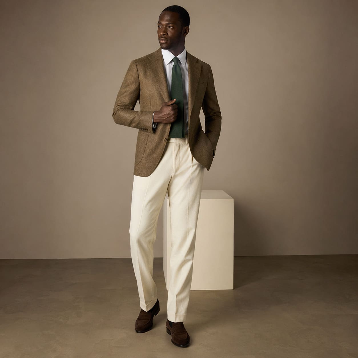 Menswear for Goodwood – Brown blazer with cream trousers and tie – Sample Image Menswear for Goodwood – Brown blazer with cream trousers and tie – Sample Image