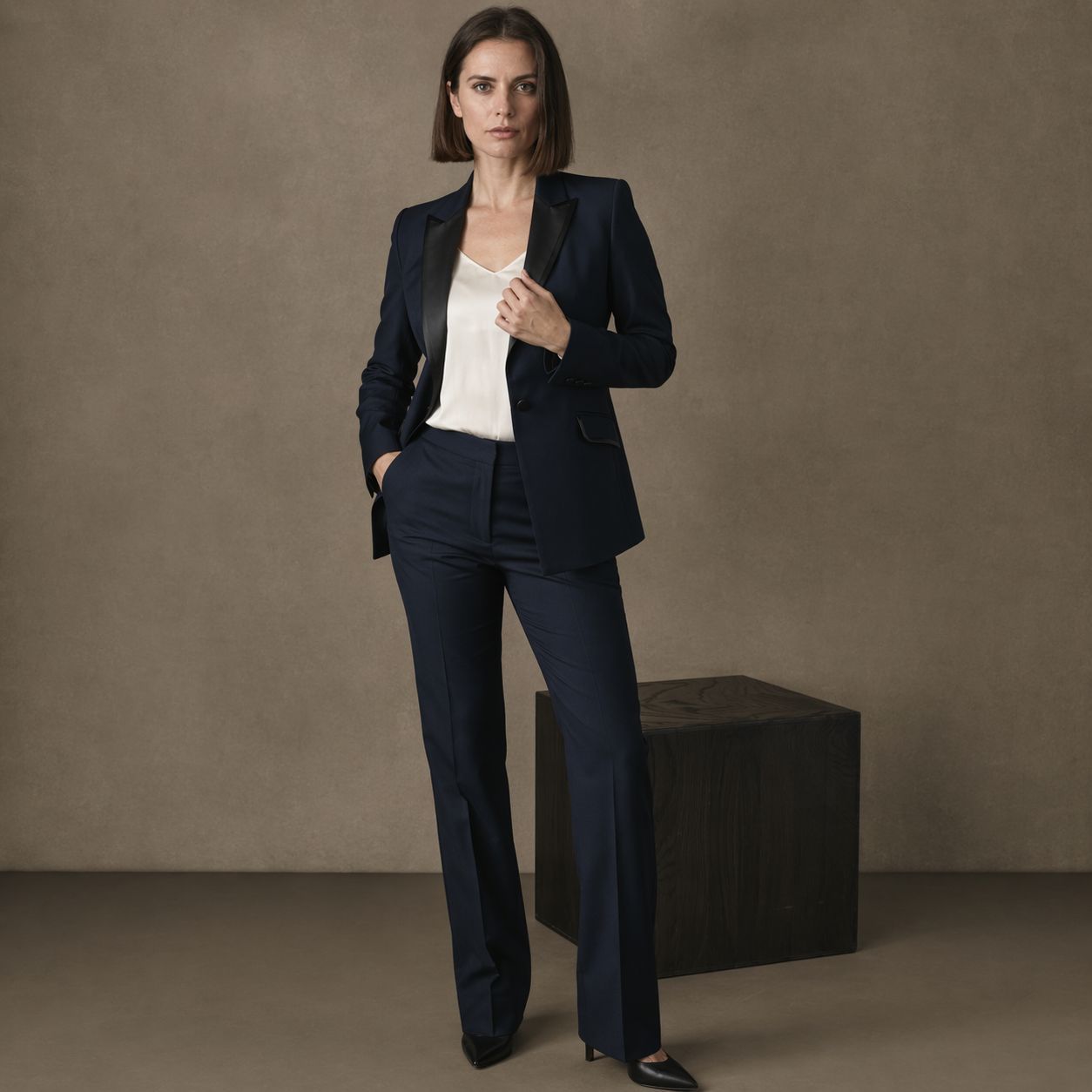 Navy tailored blazer worn with wide-leg trousers