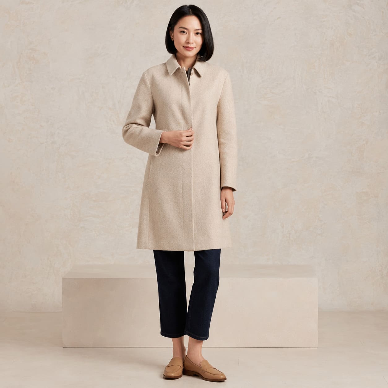 Beige longline coat with a clean, minimal tailored fit, sample image