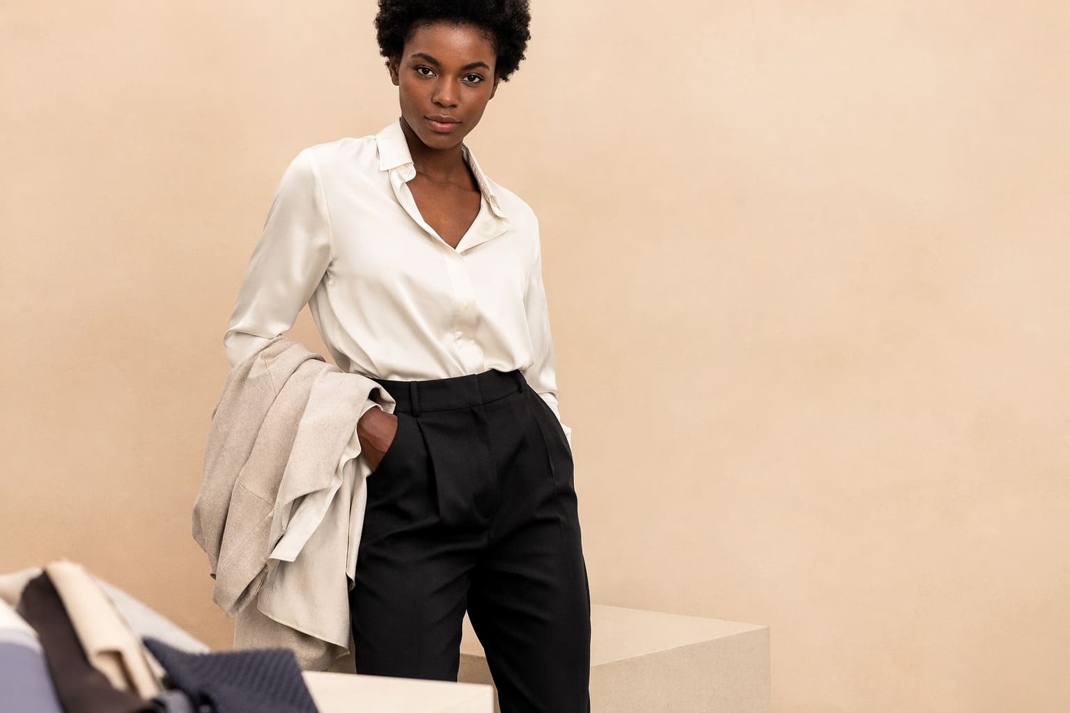 White shirt worn with black tailored trousers