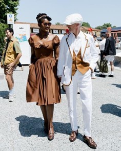 Cream summer suit with straw flat cap