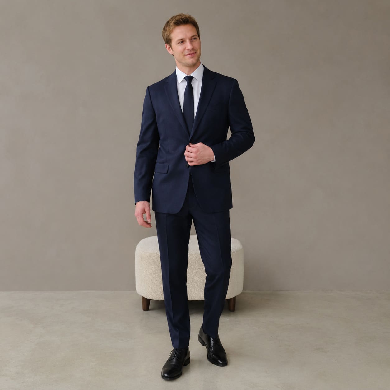 Men's Navy Made-to-Measure Suit with Dark Tie - Sample Image
