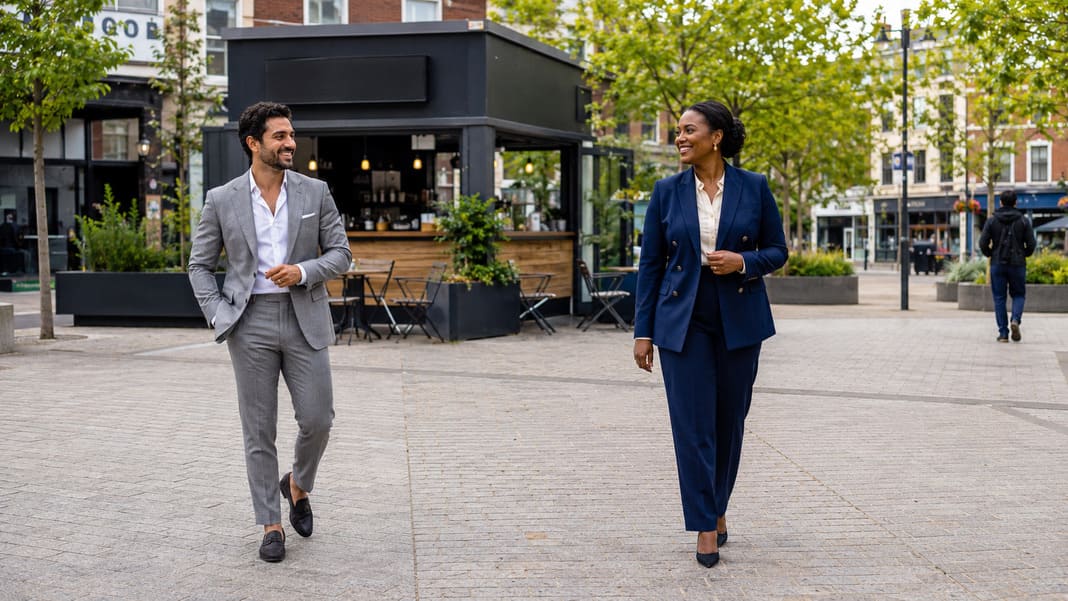 A light grey suit paired with a navy trouser suit highlights the benefits of investing in bespoke or made-to-measure tailoring, combining personalised fit, premium fabrics and versatile business styling. A light grey suit paired with a navy trouser suit highlights the benefits of investing in bespoke or made-to-measure tailoring, combining personalised fit, premium fabrics and versatile business styling.