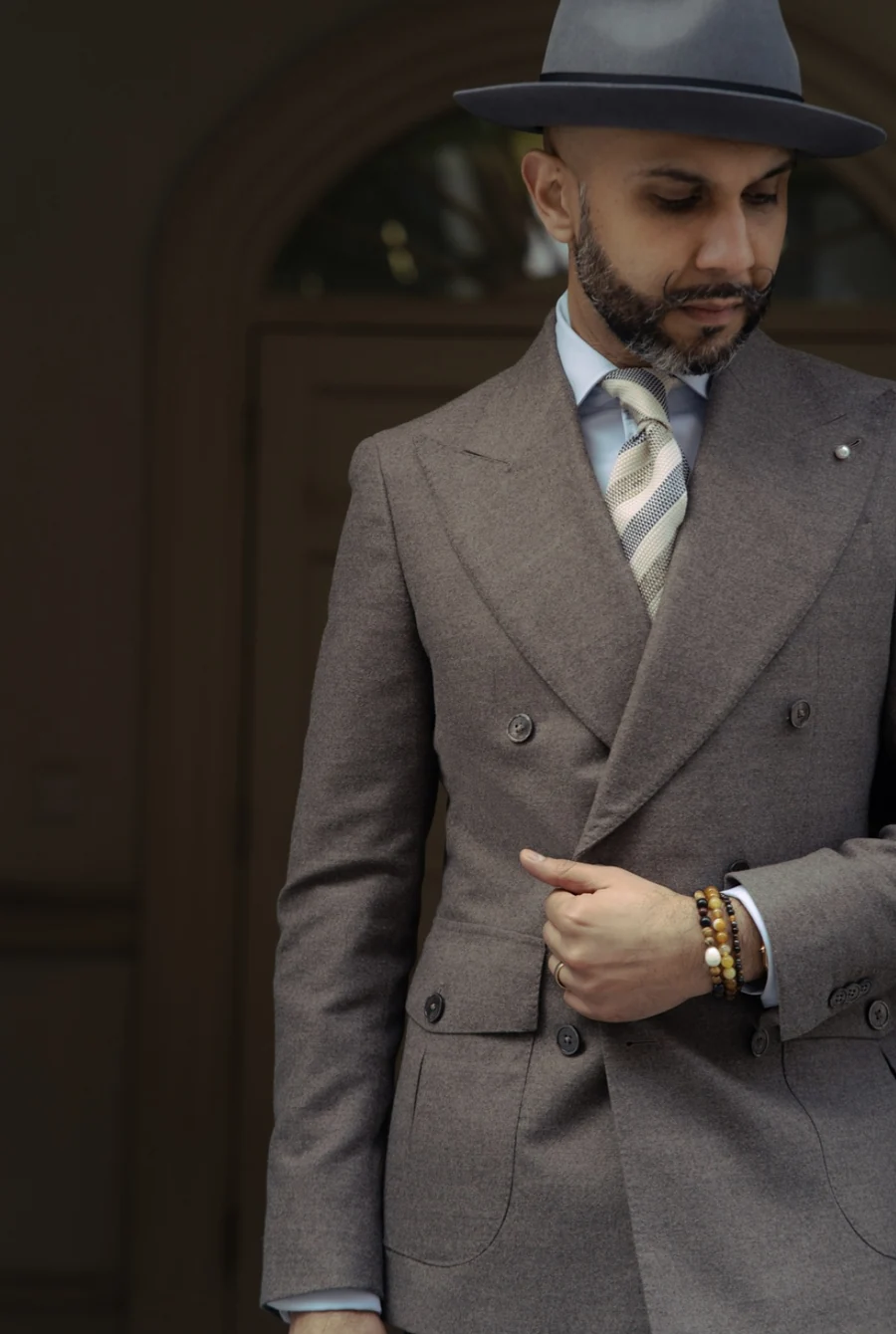 Ravi Sagoo, bespoke tailor at Fielding & Nicholson in London, wearing a bespoke suit cut to his exact measurements