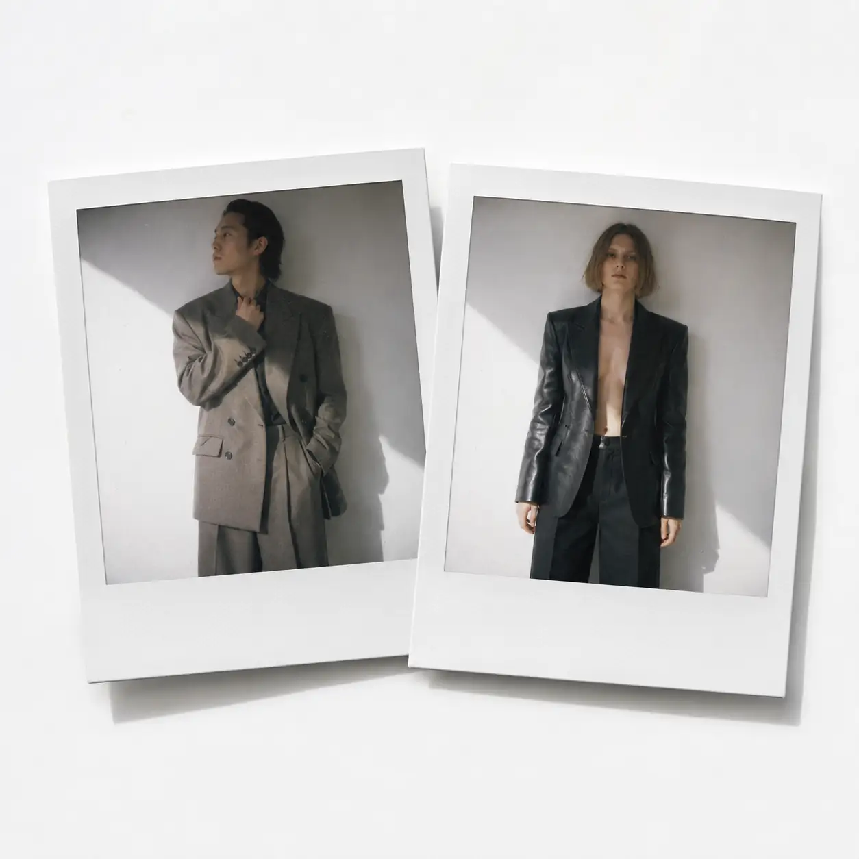 Oversized grey pinstripe suit and black leather blazer with matching trousers